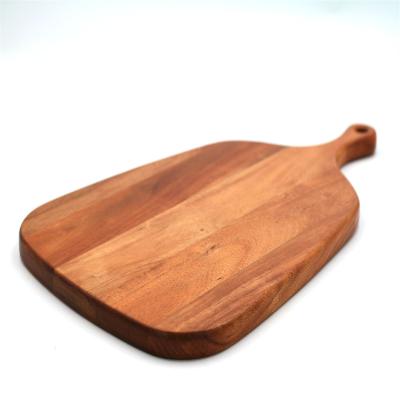 China Modern Design Sustainable Acacia Wood Chopper With Handle Food Service Cutting Boards for sale