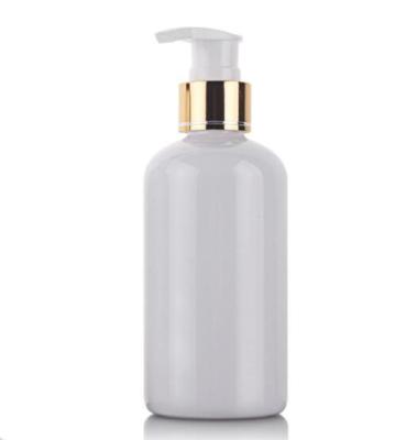 China Eco-friendly empty custom plastic white PET shampoo cosmetics golden pump bottle for body cream lotion for sale