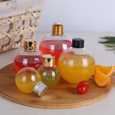 China 50ML 150ML 200ML 250ML 300ML 700ML Beverage Plastic Juice Beverage Cold Pet Bulb Beverage Milk Tea Bottle for sale