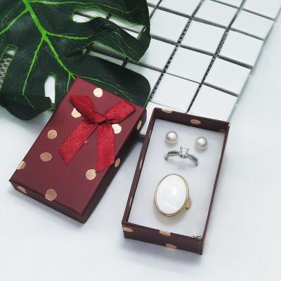 China Recycled Materials 2021 Wholesale Wave Point Hot Stamping With Bowknot Stud Earrings Gift Box Packaging for sale