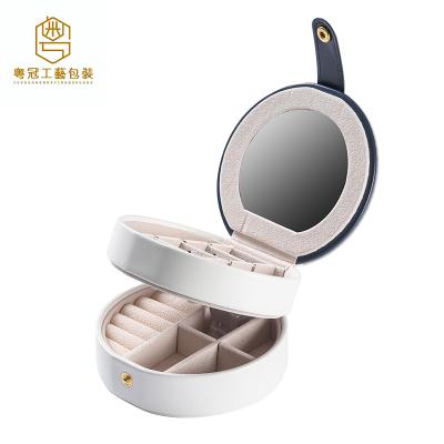 China Newest Hot Selling OEM Mini Round Double-Layer Built-in Jewelry Box Makeup Box With Mirror Ring Earring Storage Box for sale