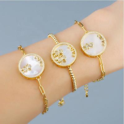 China FASHIONABLE Round Sea Shell Gold Boy Girl Kids Charm Bracelets For Women for sale