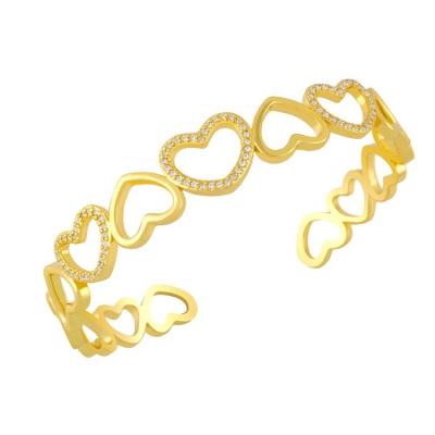 China 2021 Fashion 24k Wholesale Zircon Intimate Jewelry TRENDY Thin Layer Gold D.C.A. Charm Shape Cuff Bracelets For Women Wedding Gift for sale