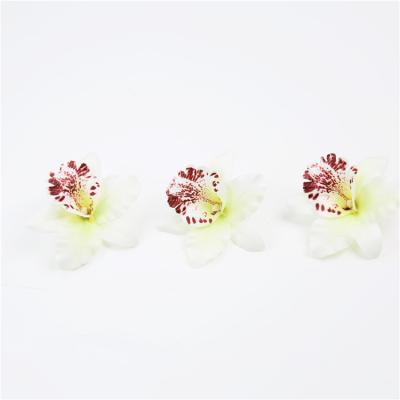 China New Design Decorative Mini Artificial Flowers Real Touch Professional Orchid Flowers for sale