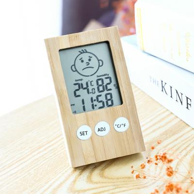 China Sapphire Crystal Glass Mirror LCD Display Screen Fashion Electronic Clocks Manufacturers Wholesale Simple Home Temperature Humidity for sale