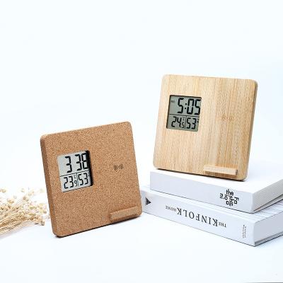 China Sapphire Crystal Glass Mirror Pure Bamboo Baby Room Decoration Wooden Mobile Phone Frame Temperature Humidity Time Home Indoor Clock for sale