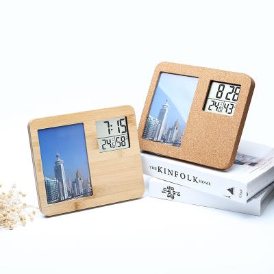 China Hot Sale Art Deco 2023 Led Digital Azan Clock Desk Wooden Clock Bedside Desk Decorations Finger Pendulum With Picture Frame for sale