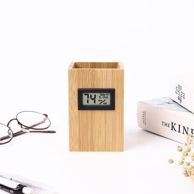 China Wholesale Multifunctional Bamboo Clock Modern Source Pen Clock Temperature Humidity Alarm Bamboo Clock for sale