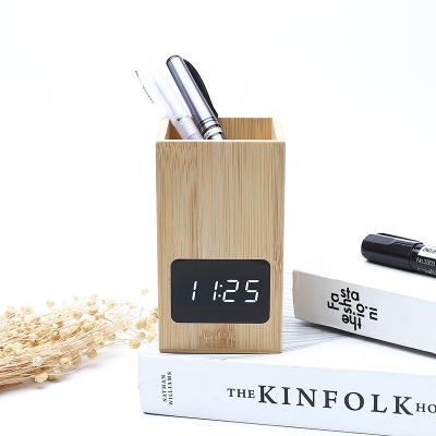 China Good Price Modern Bamboo Wooden Pen Holder Alarm Clock Multifunctional Electronic Clock for sale