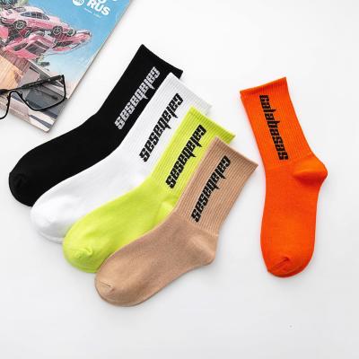 China QUICK DRY custom sock street style long tube skateboard letter sock alphabet basketball unisex high top socks for sale