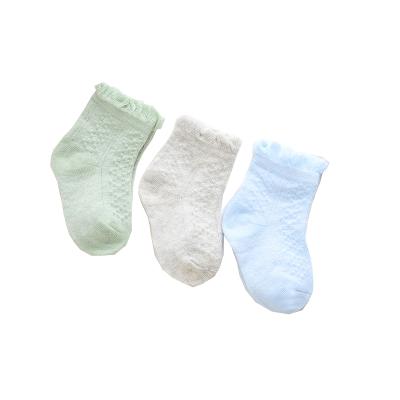 China Fashional Wholesale Newborn Baby Cotton Antibacterial Socks Anti Slip Lovely Melting Socks Lotus Leaf Mouth Socks for sale