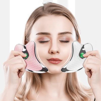 China Portable Anti-Puffiness Anti Aging Face Lifting Scrapping Electric Body Massager Dish Gua Sha Facial Massager for sale