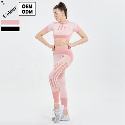 China Antibacterial Active Yoga Women High Waist Hollow-out Wear Leggings And Sports Bra Set Seamless Yoga Set 2021 for sale