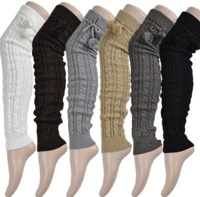 China 100% Acrylic Twisted Stretch Women's Winter Accessories With Balls Above Knee High Legless Socks Knit Leg Warmers for sale