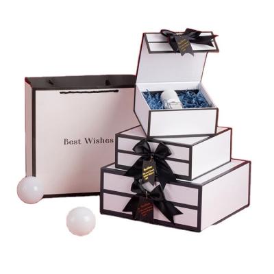 China Recyclable Modern New Design Cardboard Packing Custom Luxury Gift Boxes With Magnetic Lid With Bow for sale