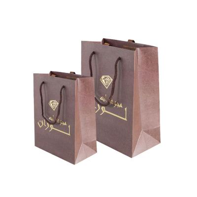 China High Quality Personalized Colorful Luxury Custom Festival Candy Paper Bag Recyclable for sale