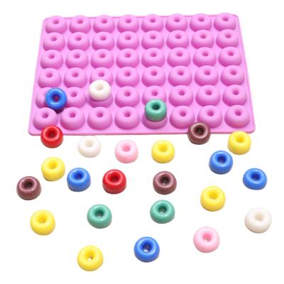 China Viable Mini 48 Cavity Nonstick Chocolate Fondant Donut Mold Silicone Donut Cake Mold for sale