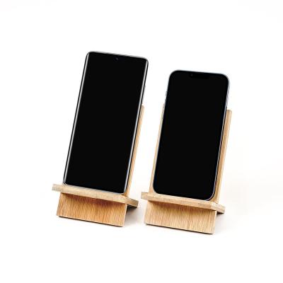 China Eco-friendly Lamp Base Beech Strip USB Wooden Mobile Stand Wooden Led Handphone Stand for sale