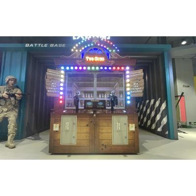 China Reliable Guns Lottery True Lottery Player Two Arcade Machine 2 Game Quality Shooting Coin Operated Shooting Equipment For Kids Adults for sale