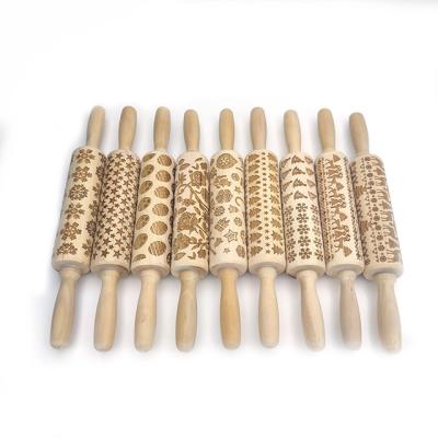 China 2022 Viable New Sale Fondant Wood Textured Christmas Rolling Embossing Pin Pattern Cookie Mold Pin Embossed Rolling Pin Wooden for sale