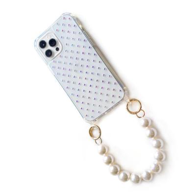 China Portable Luxury Crystal Shockproof Spark Cell Phone Case With Pearl Handle for sale