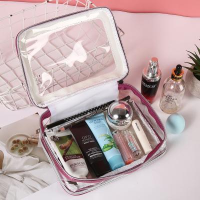 China 2021 Fashion Customized PVC Transparent Women's Large Capacity Portable Wash Bag Travel Makeup Bag And Case for sale