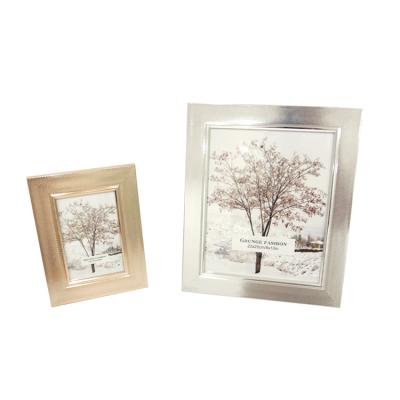 China Hot Selling Plastic Wholesaler Shiny Metallic Color Frame Fashion Home Style Photo Frame With Glass for sale