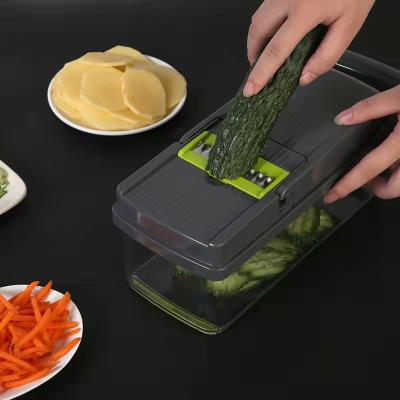 China Viable 12 in 1 Manual Vegetable Mandoline Slicer Vegetable Food Cutter Dicer Shredder with Sieve and Egg Separator for sale