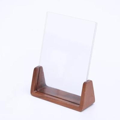 China 2022 fashionable hot black walnut photo frame U wood frame 6 inch photo frame acrylic wholesale for sale