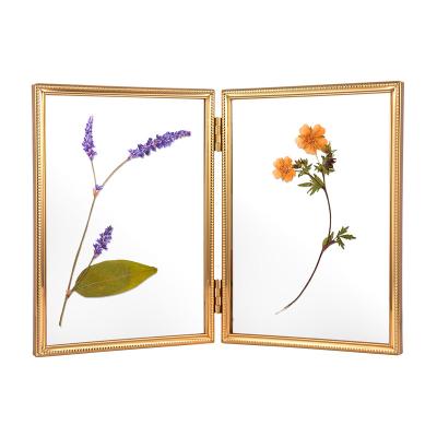 China Fashionable Customized Desktop Table Display Glass Hinged Metal Folding Picture Photo Frame Gold Silver For Home Decoration for sale