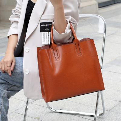 China 2022 New Italian Genuine Cowhide Shoulder Trend Matching Women's Handbags New Fashion Durable and Good Quality Genuine Luxury Genuine Leather Ladies Handbags For Women for sale