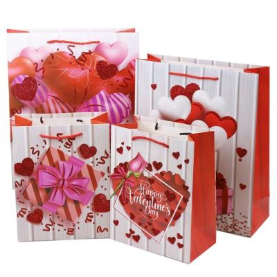 China Custom Recyclable Hot Sale Valentine's Day Mother's Day Gift Boutique Paper Shopping Bag Three Strand Party Rope for sale