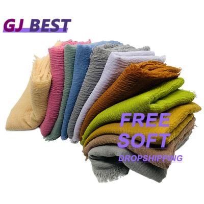 China 2022 fashion style women hijab warm high quality single color muslim scarf wholesale cotton fold cotton hijab products women 2022 for sale