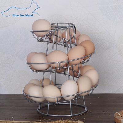 China Sustainable Modern Kitchen Spiral Dispenser Design Rack Metal Wire Egg Storage Rack for sale