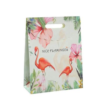 China Recycled Materials Customized Logo Printed Large Small Candy Chocolate Packaging Bag Carrying Recyclable Paper Wedding Gift Advertising Bag for sale