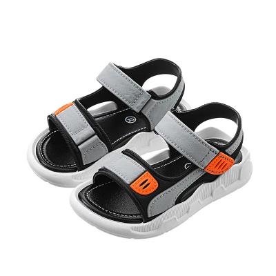 China Baotou breathable sandals children's Korean version of the small non-slip soft lower middle and large boys beach shoes baby sandals for sale