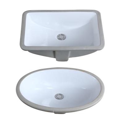 China Modern Ceramic Bathroom Vanity Oval Basin Undermount Sinks With Overflow Hole for sale