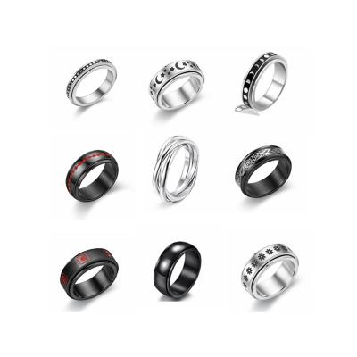 China European and American fashion jewelry wholesale can turn titanium steel couple rings stars, moons, stainless steel men's rings for sale