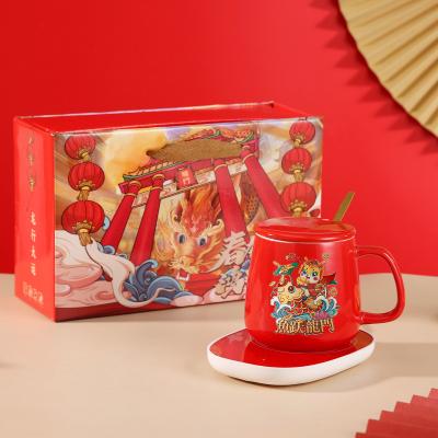 Chine Une tasse en céramique chaude à 55 degrés avec un coussin chauffant pour une chaleur constante à vendre