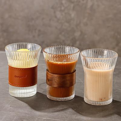 China Household Tea Cup with Heat Insulation Leather Water Bottle Creative Vertical Grain Glass for sale