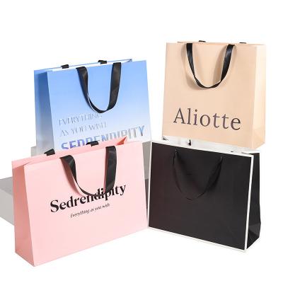 China Boutique Packaging Shopping Bag with Custom Logo Printed Luxury Paper in US Currency for sale