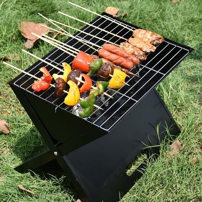 China Hot Selling Black Steel Grill Adjustable Height Folding BBQ Grill Household Charcoal Outdoor Portable BBQ Grill for sale