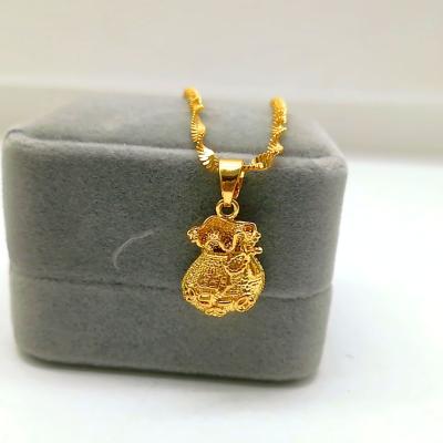 China Wholesale copper alloy bag pendant, bag shape charms luky 24K gold plating bag pendant for sale