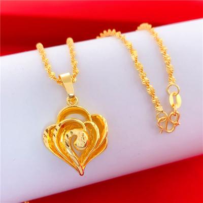 China Cute Imitation Women's Gold Plated All-match Water Wave Necklace Hollow Heart Shaped Hollow Pendant Pendant for sale