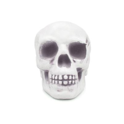 China Artificial Halloween Hanging Decoration Animated Pull Skeleton Head 6# Plastic Skull Head for sale