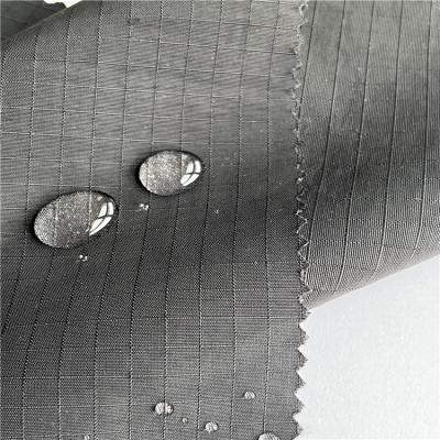 China Downproof waterproof plaid fabric ripstop nylon taslan fabric for jacket for sale