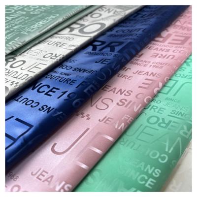 China New Product Popular Version Printed Paper Transfer Coating Shrink-Resistant Fabric For Outwear Down Jacket for sale