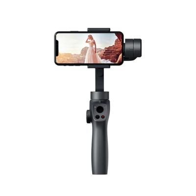 China Adjustable Stand Rotate Smart Shooting 360 Auto Tracking Mobile Stand Phone Holder for sale