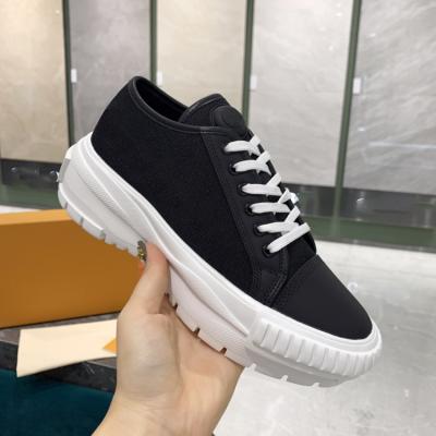 China Fashion trend woman Alexandre-mcqueen fashion canvas sneaker ladies shoes flat redneck-soled sports shoes street shooting shoes for sale