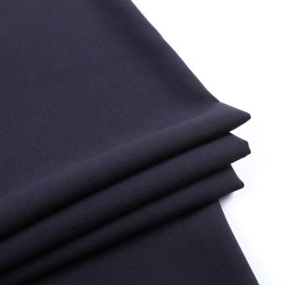 中国 Black air jet loom jersey 100% rayon plain dyed woven fine twill fabric for shirt 販売のため